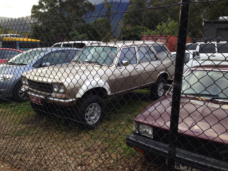 Illustration for article titled Lifted Peugeot 504 Wagon AWD. UPDATE: Thanks pip bip! It's a Dangel.